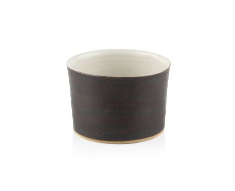Lucie Rie (1902-1995)Sugar bowlmanganese glazeimpressed potter's seal7cm high, 9.5cm diameter.  Appears good with no damage o