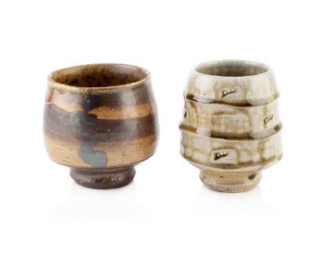 Phil Rogers (1951-2020)Two tea bowlsboth with impressed potter's seal to the footrim10cm and 9.5cm high (2).  Darker - hairli