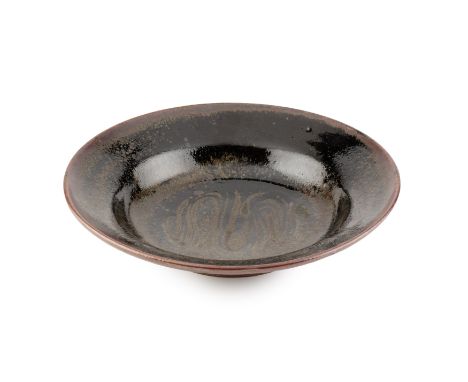 Henry Hammond (1914-1989)Dish or shallow bowltenmoku and iron glaze with combed decoration to the centreimpressed potter's se