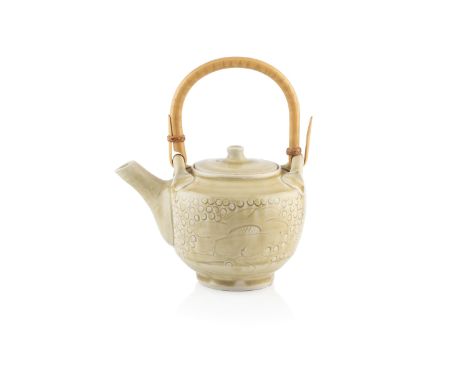 Jim Malone (b.1946) Teapotwith incised decoration to either side and a wooden handleimpressed marks to the footrim20cm high o