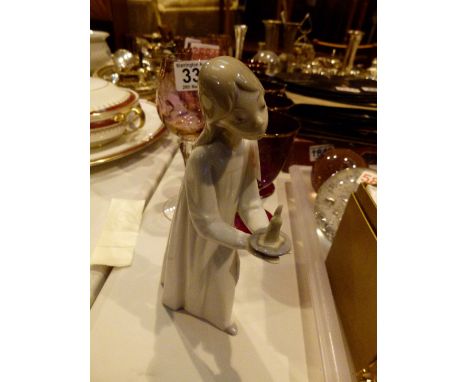 Lladro figure with candlestick