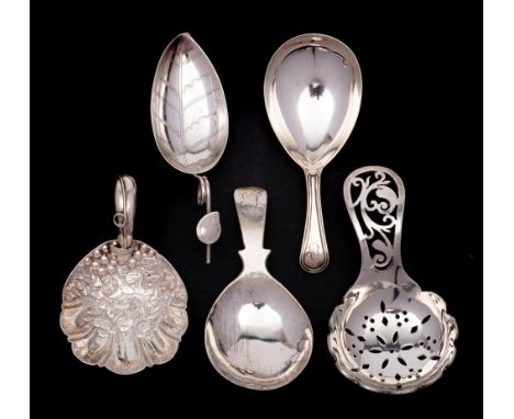 A George V silver caddy spoon, maker George Unite,  Birmingham, 1910: with shell-shaped bowl embossed with flowers, having a 