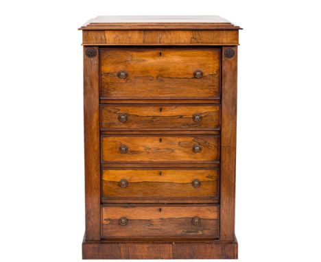 A Victorian rosewood secretaire chest of small size:, with a moulded caddy top, the hinged fall with tooled leather inset wri