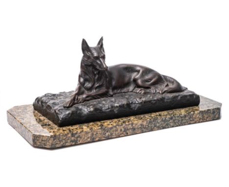 After R Varnier, a French patinated bronze model: of a recumbent  German Shepherd dog lying on its side, inscribed to the rec