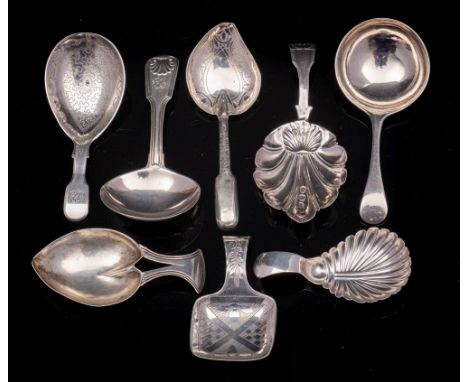A collection of eight silver caddy spoons, various makers and dates: total weight of silver 74gms, 2.38ozs