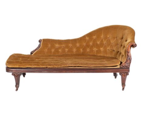 A Victorian carved rosewood chaise longue:, with shaped and upholstered stuff over button down three quarter back with acanth