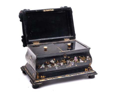 A Victorian papier-mache and mother-of-pearl inlaid tea caddy: of sarcophagus outline, the shallow domed hinged lid enclosing
