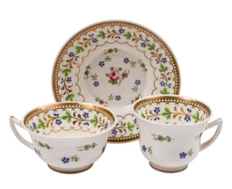 A Rockingham porcelain trio: with 'figure 7' handles, painted with a rose spray and buds within a border of cornflowers and f