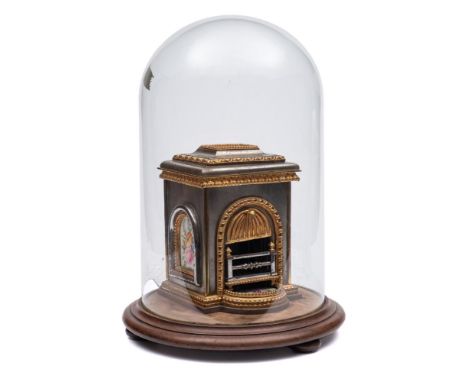 A steel and gilt metal miniature model of a fireplace: of rectangular outline,inset with arched porcelain panels to the sides