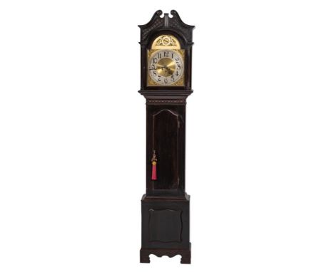 Kienzle, Germany, a 20th century longcase clock: the eight-day duration movement chiming the quarters on 4 gongs, the block b