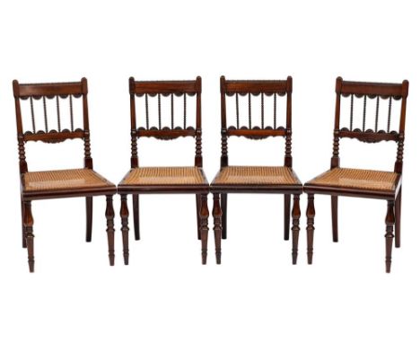 Campaign Furniture A set of four early 19th Century rosewood dining chairs: the backs with curved bar top rails, with carved 