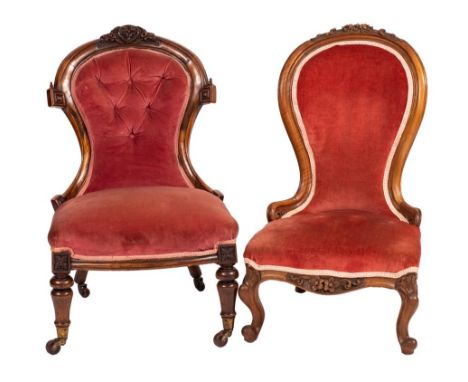 A Victorian carved walnut nursing chair:, the cartouche-shaped upholstered button down back with foliate cresting, having bow