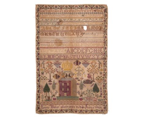 A 19th century needle work sampler worked by Lucy Baker aged 11 years, 1864: the upper section of  various fonts of upper and