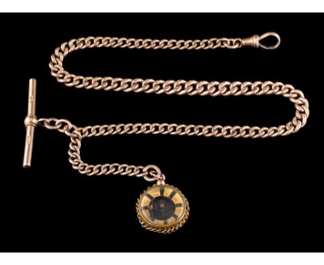 A 9ct gold albert chain: composed of curb links, with a compass attached, stamped 375, 33cm long, 30gms gross weight. 