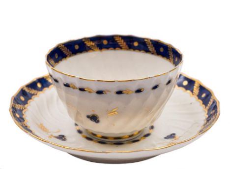 A Flight Worcester wrythen moulded teabowl and saucer and a similar Chamberlain's Worcester teabowl and saucer: the first dec