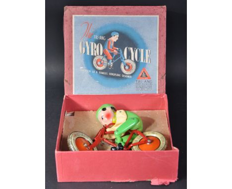 A mid-20th century vintage Lines Brothers / Tri-ang made ' Gyro Cycle ' tinplate toy. Litho-printed tin plate construction bi