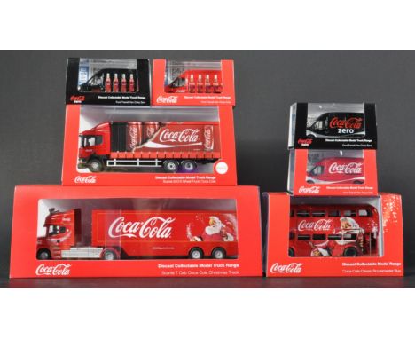 A collection of assorted Oxford Diecast made 1/76 scale Coca Cola themed models to include; Routemaster Christmas Bus, Scania