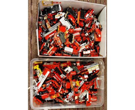 A large collection of assorted loose diecast model Fire Engines of various scales and makers to include; Corgi, Oxford Diecas