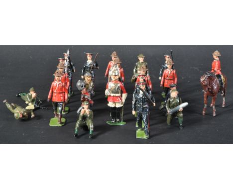 A collection of vintage Britain's made lead toy soldiers, various examples of soldiers in combat, soldiers marching with weap
