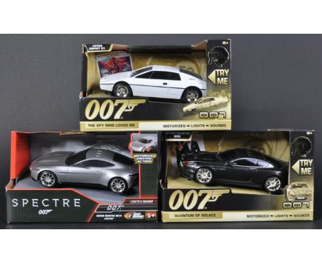 A collection of x3 boxed Toy State made James Bond 007 diecast and plastic model cars with motorised action wheels and workin