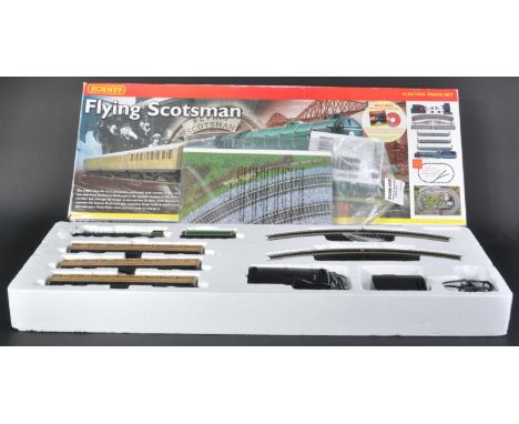An original Hornby 00 gauge model railway trainset locomotive set No. R1019 ' Flying Scotsman '. The set containing LNER Flyi