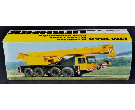 An original vintage West German Conrad Models 1/50 scale diecast model No. 2079 Liebherr LMT 1060 Mobile Crane. The model app