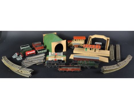 A collection vintage Hornby Dublo 00 gauge model railway trainset locomotives and a selection of rolling stock and trackside 
