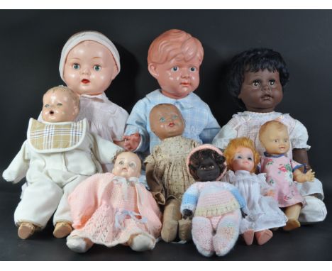 A collection of vintage 1950's and earlier plastic and bisque headed dolls. Examples to include Kader, Reliable Dolls Canada 