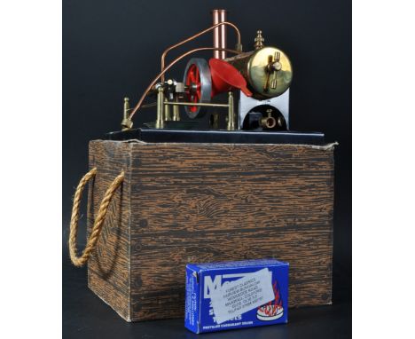 A vintage Steamco Engines Australia live steam stationary engine model No. STC-01. The model with chimney, horizontal cylinde
