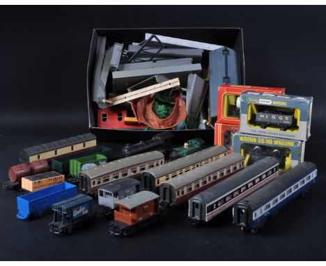 A large collection of assorted 00 gauge model railway trainset locomotive engines, coaches / wagons and trackside accessories