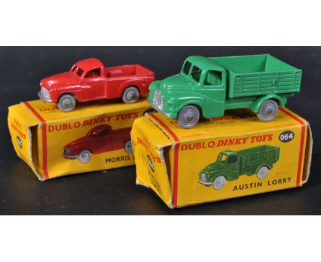 Two vintage Dublo Dinky Toys diecast models comprising No. 064 Austin Lorry and 065 Morris Pick-Up. Models appearing near min