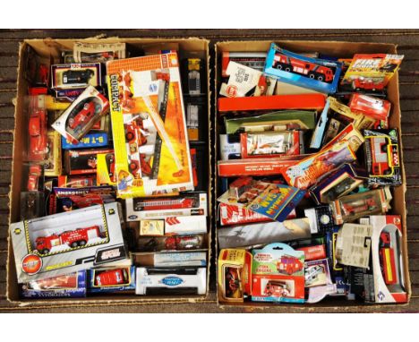 A large collection of assorted boxed diecast model Fire Engines of various scales and makers. Examples to include; Joal Compa