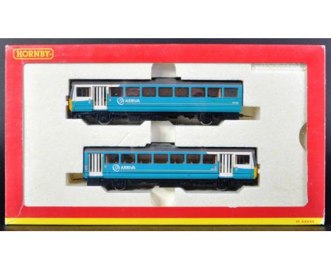 An original Hornby 00 gauge model railway trainset locomotive engine No. R2700 Class 142 Pacer 2 Car DMU in Arriva livery. Mo
