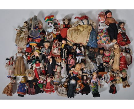 A large collection of assorted vintage dolls and figurines of European interest. Various forms of construction including wood