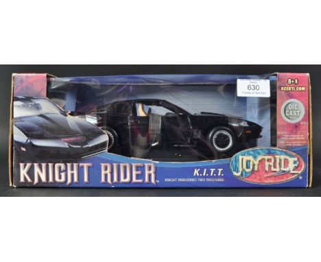 An original Ertl Joyride made 1/18 scale diecast Knight Rider model No. 33844 KITT Knight Industries Two Thousand. The detail