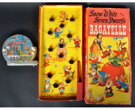 A vintage circa 1930's Chad Valley made Disney Snow White &amp; The Seven Dwarfs table top bagatelle board game and a Marx To