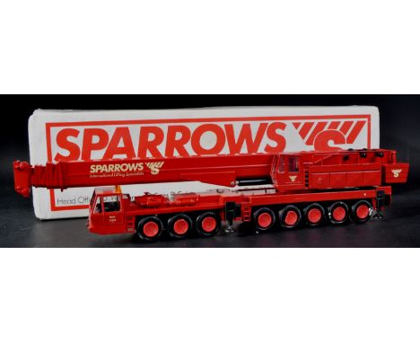 A vintage West German Conrad Models 1/50 scale diecast model No. 2077 Mobile Crane ' Sparrows '. The model appearing mint and