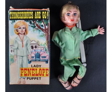 A vintage 1960's (1965) Cecil Coleman distributed Thunderbirds Lady Penelope marionette puppet. The puppet of plastic constru