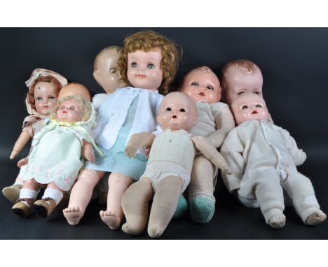 A collection of x12 vintage mid century bisque headed dolls of French and German makers to include Armand Marseille, J J Orsi