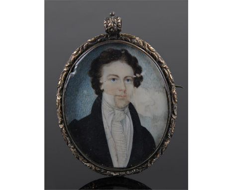 18th Century portrait miniature, oil on ivory, of a gentleman with curly hair, blue jacket and white shire, lock of hair to t