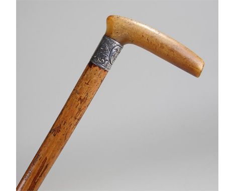 Victorian rhino horn handled walking stick, the silver collar assayed Chester 1893, the rhino handle at 10cm long raised abov