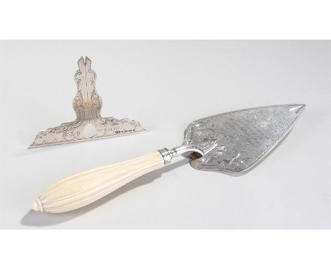 Victorian silver presentation level and trowel, Birmingham 1870, maker T.W, the trowel with the inscription "Presented by the
