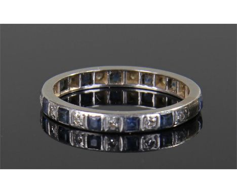 Platinum sapphire and diamond set eternity ring, with princess cut sapphires inter linked with diamonds, ring size R