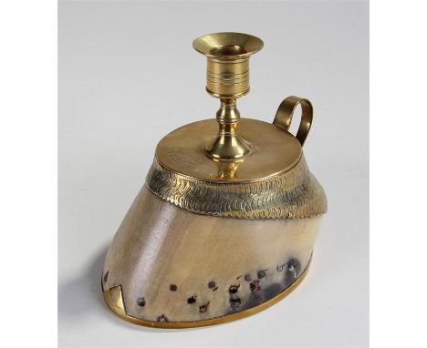 Circa 1903 horses hoof candlestick, the brass mounted hoof with a candlestick above the text 'Foundling 1888-1903' handle to 