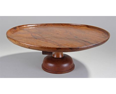 Victorian walnut lazy Susan, the dish swivel top above a turned column and domed base, 48cm diameter, 18cm high