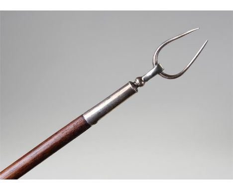 Long George III toasting fork, with steel fork end and long mahogany pole and turned handle, 102cm long