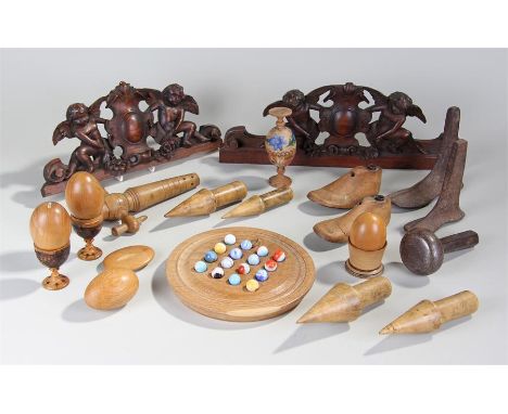 Mixed treen and metal ware, to include two cherub crests, with a pair of cherubs holding a shield, largest 40cm long, a marbl
