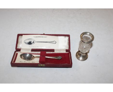 A silver footed and rimmed posy vase together with a silver Chippendale style spoon with initial terminal approx. 18gms
