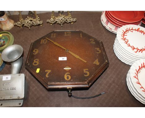 A Smiths Sectric octagonal wooden electric wall clock, sold as collectors item