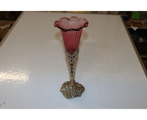 A ruby glass vase with foliate plated mount